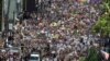 People take part in an All Black Lives Matter march, organized by Black LGBTQ+ leaders, in the aftermath of the death in Minneapolis police custody of George Floyd, in Hollywood, Los Angeles, California, June 14, 2020.