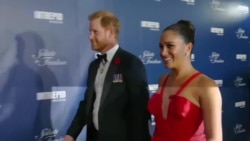 Prens Harry, Meghan Markle ak Bon Jovi Rann Omaj a Veteran yo