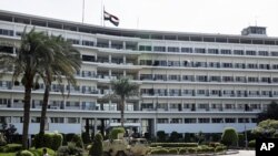 An armored vehicle guards the Maadi military hospital in Cairo, where Hosni Mubarak is being kept, June 20, 2012 (AP).