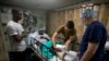 A man gets free medical attention on the U.S. Navy's hospital ship USNS Comfort anchored off Port-au-Prince, Haiti, Nov. 8, 2019. 