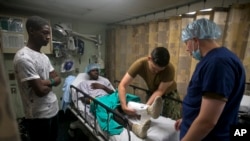 A man gets free medical attention on the U.S. Navy's hospital ship USNS Comfort anchored off Port-au-Prince, Haiti, Nov. 8, 2019. 