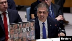 FILE - Israel's Foreign Affairs Minister Eli Cohen speaks during a meeting of the Security Council on the conflict between Israel and the Palestinian Islamist group Hamas at U.N. headquarters in New York, U.S., October 24, 2023. 