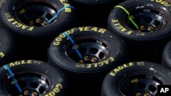 FILE - Goodyear Eagle tires are shown during a NASCAR Cup Series auto race at Michigan International Speedway, in Brooklyn, Michigan, Aug. 9, 2020.