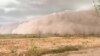 Imposing Dust Storm Dwarfs Argentine Landscape 