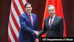 资料照片：美国国务卿卢比奥在德国慕尼黑与中国外交部长王毅会晤。(2026年2月13日)