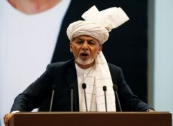 FILE - Afghanistan's President Ashraf Ghani speaks during a consultative grand assembly in Kabul, Afghanistan, April 29, 2019.