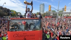 Parade en l'honneur des Raptors, nouveaux champions de la NBA, Toronto, Canada, le 17 juin 2019. 