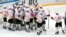 FILE - Kunlun Red Star's team players celebrate after they won the Kontinental Hockey League match against Spartak Moscow, Oct. 1, 2016, in Moscow, Russia.