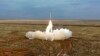 FILE - This photo taken from video provided by the Russian Defense Ministry Press Service on Feb. 19, 2022, shows a Russian Iskander-K missile launched during a military exercise at a training ground in Russia.