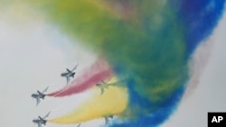The Chinese Bayi aerobatics team takes to the sky at the 15th China International Aviation and Aerospace Exhibition, also known as Airshow China 2024, at Zhuhai in southern China&#39;s Guangdong province. (AP Photo/Ng Han Guan)