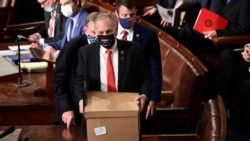 Electoral College ballot boxes arrive to a joint session of the Congress to certify the 2020 election results on Capitol Hill in Washington, Jan. 6, 2021.