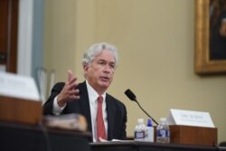 CIA Director William Burns gestures as he speaks during a House Intelligence Committee hearing on worldwide threats in Washington, April 15, 2021.