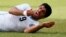 Uruguay's Luis Suarez reacts after clashing with Italy's Giorgio Chiellini during their 2014 World Cup Group D soccer match at the Dunas arena in Natal, June 24, 2014. 