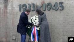 U.S. Vice President JD Vance and second lady Usha Vance lay a wreath at the Dachau Concentration Camp Memorial Site outside Munich, Germany, Feb. 13, 2025.