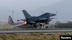 FILE - A U.S. Air Force F-16 Fighting Falcon aircraft takes off for a mission from Bagram Airfield, Afghanistan, Aug. 22, 2017. 