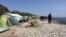 FILE - A beach camp for refugees in Lesbos, Greece, April 4, 2016. (H. Murdock/VOA)