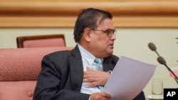 The speaker of Nepal's parliament Krishna Bahadur Mahara resigns, Oct. 1, 2019, following allegations that he raped a government worker at her home.