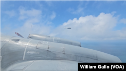 A Chinese fighter jet shadows a Canadian CP-140 military surveillance plane in international waters off China's coast, Oct. 14, 2024.