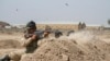 Iraqi soldiers train with members of the U.S. Army 3rd Brigade Combat Team, 82nd Airborne Division, at Camp Taji, Iraq, in this U.S. Army photo released June 2, 2015. 