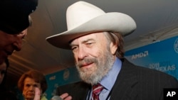 FILE - Actor Rip Torn arrives on the red carpet at the Texas Film Hall of Fame Awards in Austin, Texas, March 10, 2011.