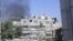 Smoke rises from the suburb of Erbeen in Damascus, Syria. (file)