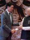 FILE - Indian Prime Minister Narendra Modi and Canada Prime Minister Justin Trudeau in New Delhi, Sept. 9, 2023. The two have denounced the violence that erupted Sunday at several locations in suburban Toronto, including a Hindu temple.