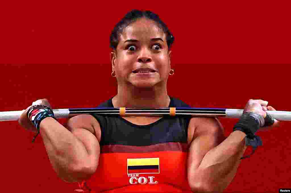 Weightlifter Mercedes Perez of Colombia competes in the women&#39;s 64kg during the Tokyo 2020 Olympics at Tokyo International Forum, Tokyo, Japan.