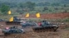 FILE - Taiwan tanks roll on the "battlefield" during the annual Han Kuang military exercise in Hukou, Hsinchu County about 50 km (30 miles) south of the capital Taipei, May 17, 2007.