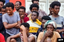 FILE - Migrants from Ethiopia's Amhara region protest against the lack of basic services and call for international organisations to facilitate their repatriation, in Yemen's southern port city of Aden on September 7, 2023.