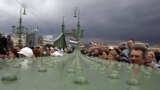 Supporters listen to the speech of the former Hungarian prime minister and chairman of Democratic Coalition Party, Ferenc Gyurcsany (not in pic) during a demonstration on the Freedom Bridge in Budapest, Hungary.&nbsp;