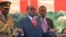 FILE Zimbabwean President Robert Mugabe addresses supporters at the party headquarters in Harare, Wednesday Feb, 10, 2016. 