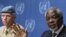 Joint Special Envoy of the United Nations and the Arab League for Syria Kofi Annan (R) gestures next to Major-General Robert Mood, head of the UN Supervision Mission in Syria during a news conference at the UN European headquarters in Geneva, June 22, 201