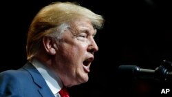 FILE - President Donald Trump speaks at the North Side Gymnasium in Elkhart, Ind., May 10, 2018.