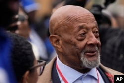 Selma Civil Rights foot soldier Charles Mauldin prepares to march during the 60th anniversary of the march to ensure that African Americans could exercise their constitutional right to vote, March 9, 2025, in Selma, Ala.