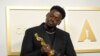 Daniel Kaluuya, winner of the award for best actor in a supporting role for "Judas and the Black Messiah," poses in the press room at the Oscars on Sunday, April 25, 2021, at Union Station in Los Angeles. (AP Photo/Chris Pizzello, Pool)
