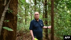 FILE - This picture taken on November 22, 2023 shows Stephen Elliott, research director at Chiang Mai University's Forest Restoration Research Unit (FORRU), speaking to AFP in a reforested area of a hillside near Chiang Mai.