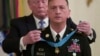 President Donald Trump awards the Medal of Honor to Army Staff Sgt. David Bellavia in the East Room of the White House in Washington, June 25, 2019, for conspicuous gallantry.