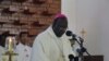 FILE - Archbishop Paulino Lukudu Loro leads a mass in Juba, South Sudan on Dec. 15, 2014.