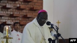 FILE - Archbishop Paulino Lukudu Loro leads a mass in Juba, South Sudan on Dec. 15, 2014.