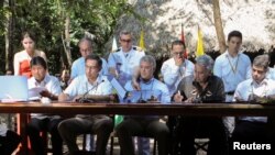 Bolivia's Evo Morales, Peru's Martin Vizcarra, Colombia's Ivan Duque, Ecuador's Lenin Moreno, all Presidents , and Suriname VP Michael Ashwin Adhin sign a Amazon pact, Sept. 6, 2019.
