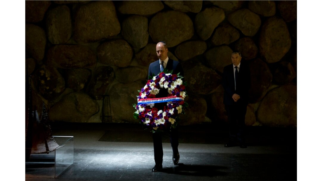 FILE - Britain's Prince William pays respects during a ceremony at the Hall of Remembrance at the Yad Vashem Holocaust memorial in Jerusalem, Israel, June 26, 2018.