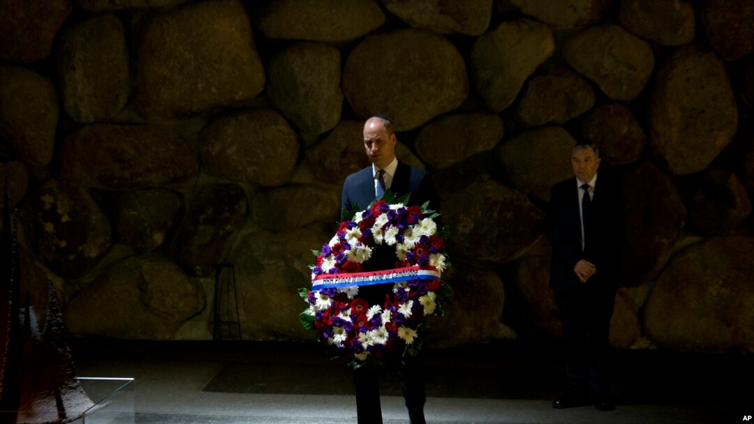 Britain's Prince William pays respects during a ceremony at the Hall of Remembrance at the Yad Vashem Holocaust memorial in Jerusalem, Israel, Tuesday, June 26, 2018. 
