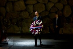 FILE - Britain's Prince William pays respects during a ceremony at the Hall of Remembrance at the Yad Vashem Holocaust memorial in Jerusalem, Israel, June 26, 2018.