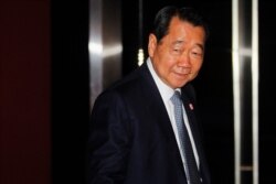 FILE - Dhanin Chearavanont, chairman of Thailand's largest agribusiness group, Charoen Pokphand Food, arrives at a Thailand-China Business Council Seminar in Bangkok, March 15, 2013.