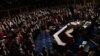 FILE - Members of the 118th Congress raise their right hands as they are sworn into office to serve in the U.S. House of Representatives on the fourth day of Congress at the U.S. Capitol in Washington, Jan. 7, 2023.