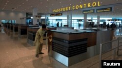 A supporter of India&#39;s main opposition Congress party&nbsp; reacts as she is detained by police during a protest after the party leader Rahul Gandhi was summoned by the Enforcement Directorate in a money laundering case, in Ahmedabad.