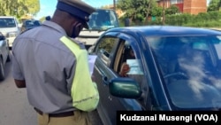 Zimbabwe police manning a roadblock during the COVID-19 lockdown.