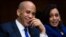 Sen. Cory Booker, D- N.J., speaks with Sen. Kamala Harris, D-Calif., during a Senate Judiciary Committee hearing on police use of force and community relations on on Capitol Hill, June 16, 2020 in Washington.