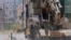 TOPSHOT - Israeli forces storm the Palestinian refugee camp of Jenin in the occupied West Bank on May 21, 2024, in what the military said was a "counterterrorism operation", without providing further details.
