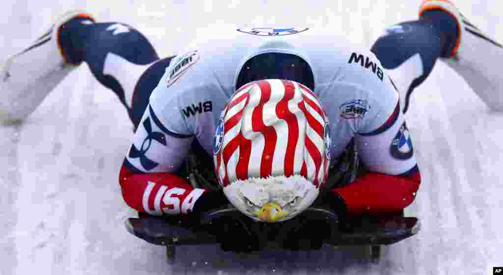 Katie Uhlaender of the United States reacts at the end of her run during the women&#39;s skeleton race at the Bobsleigh and Skeleton World Championships in Altenberg, Germany.